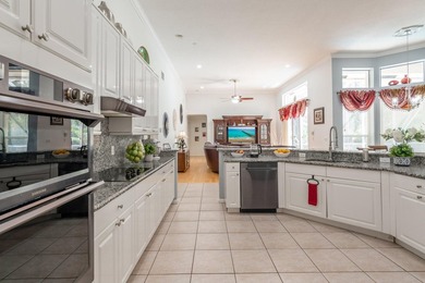 This updated home with NEW ROOF offers an open split floor plan on Binks Forest Golf Club in Florida - for sale on GolfHomes.com, golf home, golf lot