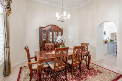 This updated home with NEW ROOF offers an open split floor plan on Binks Forest Golf Club in Florida - for sale on GolfHomes.com, golf home, golf lot