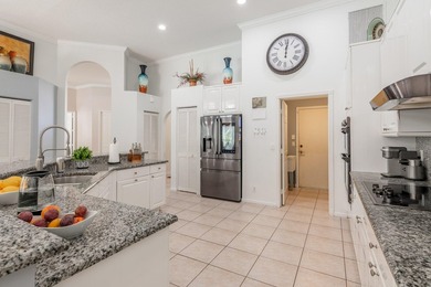 This updated home with NEW ROOF offers an open split floor plan on Binks Forest Golf Club in Florida - for sale on GolfHomes.com, golf home, golf lot