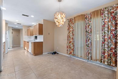 Discover the potential of this perfect fixer-upper located in on Plantation Bay Golf and Country Club in Florida - for sale on GolfHomes.com, golf home, golf lot