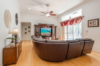 This updated home with NEW ROOF offers an open split floor plan on Binks Forest Golf Club in Florida - for sale on GolfHomes.com, golf home, golf lot