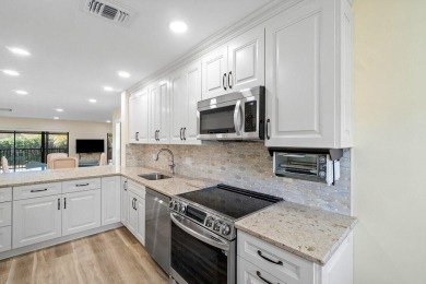 Beautifully updated convertible 3 bedroom, 2 bath condo located on Hunters Run Golf and Country Club in Florida - for sale on GolfHomes.com, golf home, golf lot