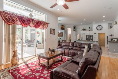 This updated home with NEW ROOF offers an open split floor plan on Binks Forest Golf Club in Florida - for sale on GolfHomes.com, golf home, golf lot