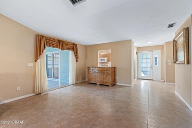 Discover the potential of this perfect fixer-upper located in on Plantation Bay Golf and Country Club in Florida - for sale on GolfHomes.com, golf home, golf lot