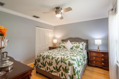 This updated home with NEW ROOF offers an open split floor plan on Binks Forest Golf Club in Florida - for sale on GolfHomes.com, golf home, golf lot