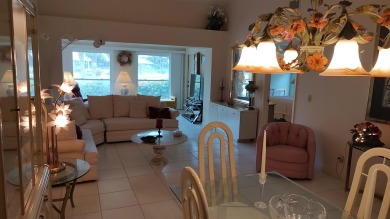 Make this 2Br Villa with awesome Golf Course view and on Eagle Wood Golf Course in Florida - for sale on GolfHomes.com, golf home, golf lot