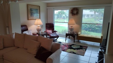 Make this 2Br Villa with awesome Golf Course view and on Eagle Wood Golf Course in Florida - for sale on GolfHomes.com, golf home, golf lot