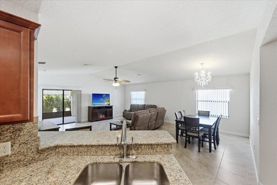 This beautiful 2017 built home is located in the highly on Spanish Lakes I in Florida - for sale on GolfHomes.com, golf home, golf lot