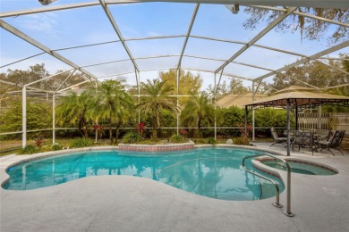 YOUR PRIVATE OASIS IN TUSCAWILLA. This elegant Glen Eagle custom on Tuscawilla Country Club in Florida - for sale on GolfHomes.com, golf home, golf lot