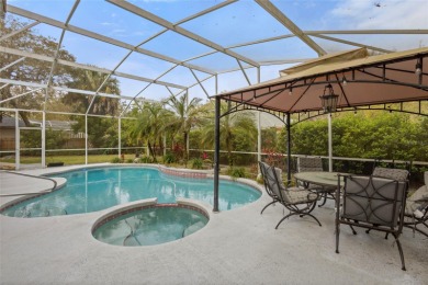 YOUR PRIVATE OASIS IN TUSCAWILLA. This elegant Glen Eagle custom on Tuscawilla Country Club in Florida - for sale on GolfHomes.com, golf home, golf lot