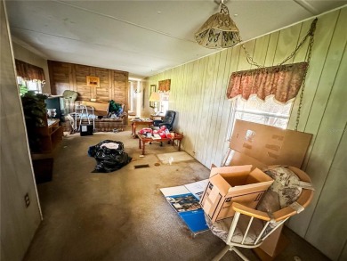 INVESTOR SPECIAL! VALUE IS IN THE LAND. NO INSPECTIONS. CASH on Orange Blossom Hills Golf and Country Club in Florida - for sale on GolfHomes.com, golf home, golf lot