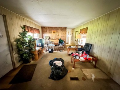 INVESTOR SPECIAL! VALUE IS IN THE LAND. NO INSPECTIONS. CASH on Orange Blossom Hills Golf and Country Club in Florida - for sale on GolfHomes.com, golf home, golf lot