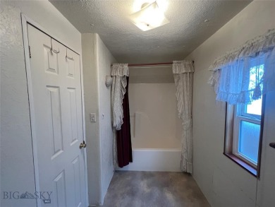 Looking for a spacious and affordable home in Butte? Look no on Highland View Golf Course - Highland View in Montana - for sale on GolfHomes.com, golf home, golf lot