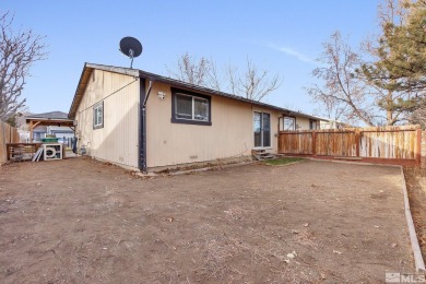 This charming home offers a cozy and inviting atmosphere with on Sierra Sage Golf Course in Nevada - for sale on GolfHomes.com, golf home, golf lot