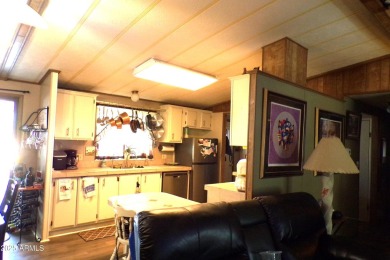 Golf Course Manufactured Home  on large lot with a 2 car garage on Queen Valley Golf Course in Arizona - for sale on GolfHomes.com, golf home, golf lot