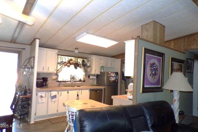 Golf Course Manufactured Home  on large lot with a 2 car garage on Queen Valley Golf Course in Arizona - for sale on GolfHomes.com, golf home, golf lot