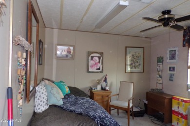 Golf Course Manufactured Home  on large lot with a 2 car garage on Queen Valley Golf Course in Arizona - for sale on GolfHomes.com, golf home, golf lot