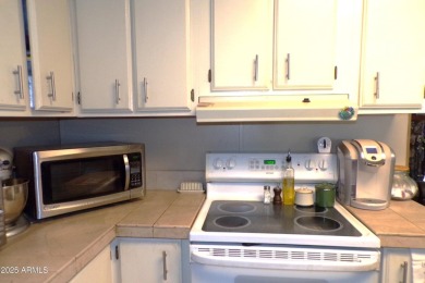 Golf Course Manufactured Home  on large lot with a 2 car garage on Queen Valley Golf Course in Arizona - for sale on GolfHomes.com, golf home, golf lot