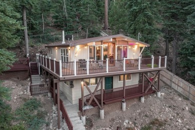 Treehouse vibes and Moonridge magic--this cabin places you at on Big Bear Mountain Ski and Golf Resort in California - for sale on GolfHomes.com, golf home, golf lot