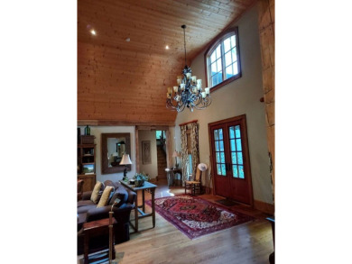 Privately situated in Highlands Country Club, overlooking the on Highlands Country Club in North Carolina - for sale on GolfHomes.com, golf home, golf lot