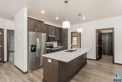 Spacious and Open Freedom 115 Floor Plan Villa Home in the on Brandon Municipal Golf Course in South Dakota - for sale on GolfHomes.com, golf home, golf lot