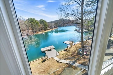 Welcome to the lake life! Nestled within the sought after on The Highlands Course at Lake Arrowhead in Georgia - for sale on GolfHomes.com, golf home, golf lot