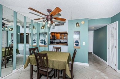 This 2-bedroom, 2-bath condo has a unique remodel with a privacy on Cove Cay Country Club in Florida - for sale on GolfHomes.com, golf home, golf lot