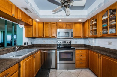 This 2-bedroom, 2-bath condo has a unique remodel with a privacy on Cove Cay Country Club in Florida - for sale on GolfHomes.com, golf home, golf lot