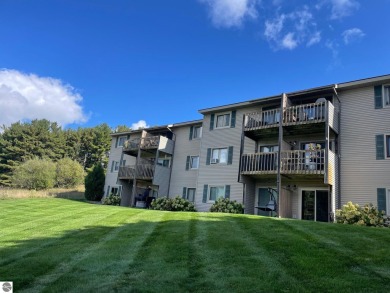 Immaculate, well-maintained two bedroom condominium borders The on Crown Golf Course in Michigan - for sale on GolfHomes.com, golf home, golf lot