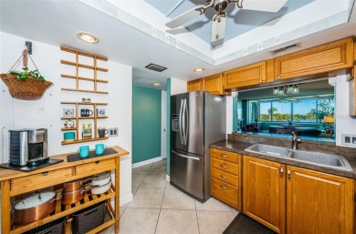 This 2-bedroom, 2-bath condo has a unique remodel with a privacy on Cove Cay Country Club in Florida - for sale on GolfHomes.com, golf home, golf lot