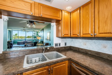 This 2-bedroom, 2-bath condo has a unique remodel with a privacy on Cove Cay Country Club in Florida - for sale on GolfHomes.com, golf home, golf lot