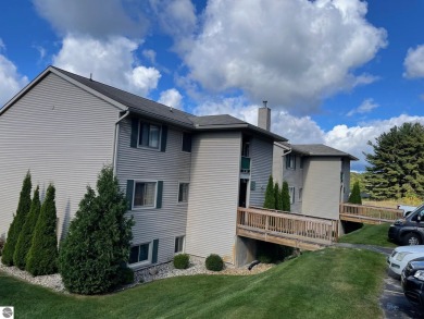 Immaculate, well-maintained two bedroom condominium borders The on Crown Golf Course in Michigan - for sale on GolfHomes.com, golf home, golf lot