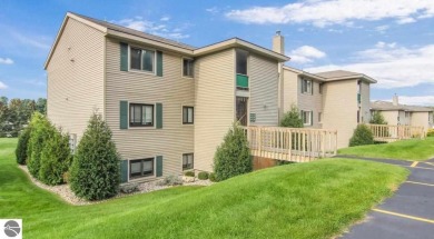 Immaculate, well-maintained two bedroom condominium borders The on Crown Golf Course in Michigan - for sale on GolfHomes.com, golf home, golf lot