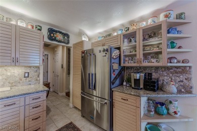 STUNNING WATER FRONT LOCATION OVERLOOKING LAKE AND WATERFALLS on Spanish Trail Golf and Country Club in Nevada - for sale on GolfHomes.com, golf home, golf lot