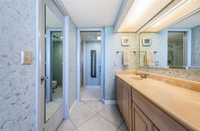 This 2-bedroom, 2-bath condo has a unique remodel with a privacy on Cove Cay Country Club in Florida - for sale on GolfHomes.com, golf home, golf lot