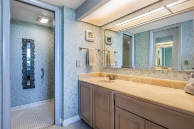 This 2-bedroom, 2-bath condo has a unique remodel with a privacy on Cove Cay Country Club in Florida - for sale on GolfHomes.com, golf home, golf lot