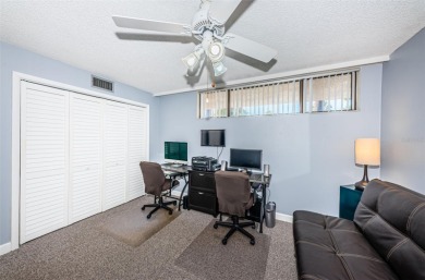 This 2-bedroom, 2-bath condo has a unique remodel with a privacy on Cove Cay Country Club in Florida - for sale on GolfHomes.com, golf home, golf lot