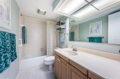 This 2-bedroom, 2-bath condo has a unique remodel with a privacy on Cove Cay Country Club in Florida - for sale on GolfHomes.com, golf home, golf lot