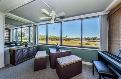 This 2-bedroom, 2-bath condo has a unique remodel with a privacy on Cove Cay Country Club in Florida - for sale on GolfHomes.com, golf home, golf lot