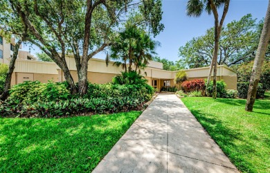 This 2-bedroom, 2-bath condo has a unique remodel with a privacy on Cove Cay Country Club in Florida - for sale on GolfHomes.com, golf home, golf lot