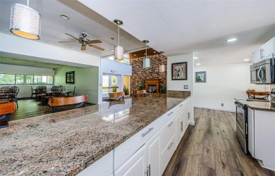 This 2-bedroom, 2-bath condo has a unique remodel with a privacy on Cove Cay Country Club in Florida - for sale on GolfHomes.com, golf home, golf lot