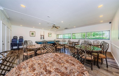 This 2-bedroom, 2-bath condo has a unique remodel with a privacy on Cove Cay Country Club in Florida - for sale on GolfHomes.com, golf home, golf lot