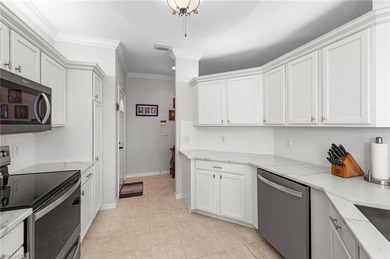 This beautifully updated coach home offers three full bedrooms on Stoneybrook Golf Club in Florida - for sale on GolfHomes.com, golf home, golf lot