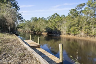 Beautiful waterfront lot with deep water access located just on Diamondhead Country Club in Mississippi - for sale on GolfHomes.com, golf home, golf lot