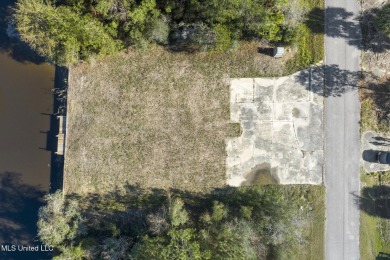 Beautiful waterfront lot with deep water access located just on Diamondhead Country Club in Mississippi - for sale on GolfHomes.com, golf home, golf lot