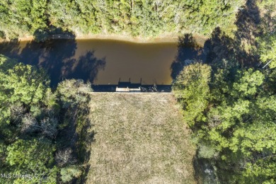 Beautiful waterfront lot with deep water access located just on Diamondhead Country Club in Mississippi - for sale on GolfHomes.com, golf home, golf lot