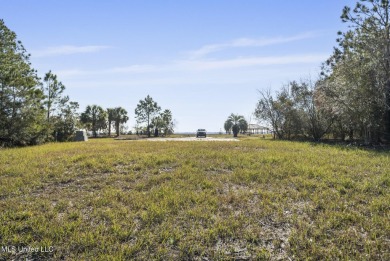 Beautiful waterfront lot with deep water access located just on Diamondhead Country Club in Mississippi - for sale on GolfHomes.com, golf home, golf lot