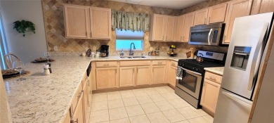 NO BOND. 2/2 Block  Stucco Courtyard Villa in the Village of on Glenview Championship Golf and Country Club in Florida - for sale on GolfHomes.com, golf home, golf lot