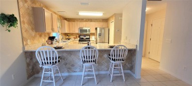 NO BOND. 2/2 Block  Stucco Courtyard Villa in the Village of on Glenview Championship Golf and Country Club in Florida - for sale on GolfHomes.com, golf home, golf lot