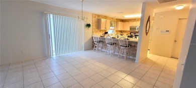 NO BOND. 2/2 Block  Stucco Courtyard Villa in the Village of on Glenview Championship Golf and Country Club in Florida - for sale on GolfHomes.com, golf home, golf lot